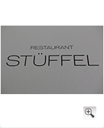 Logo Prägung Restaurant Stüffel